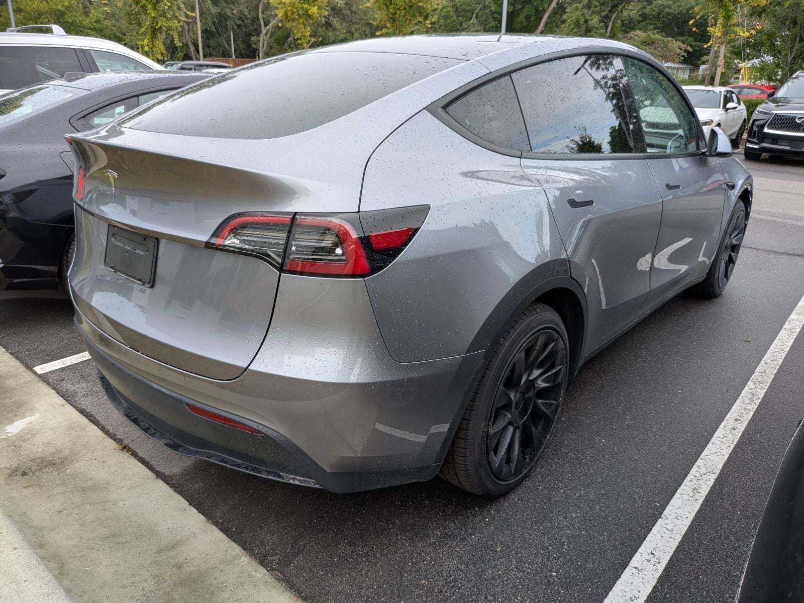 Used 2025 Tesla Model Y Long Range with VIN 7SAYGDED6SA371380 for sale in Wilmington, NC