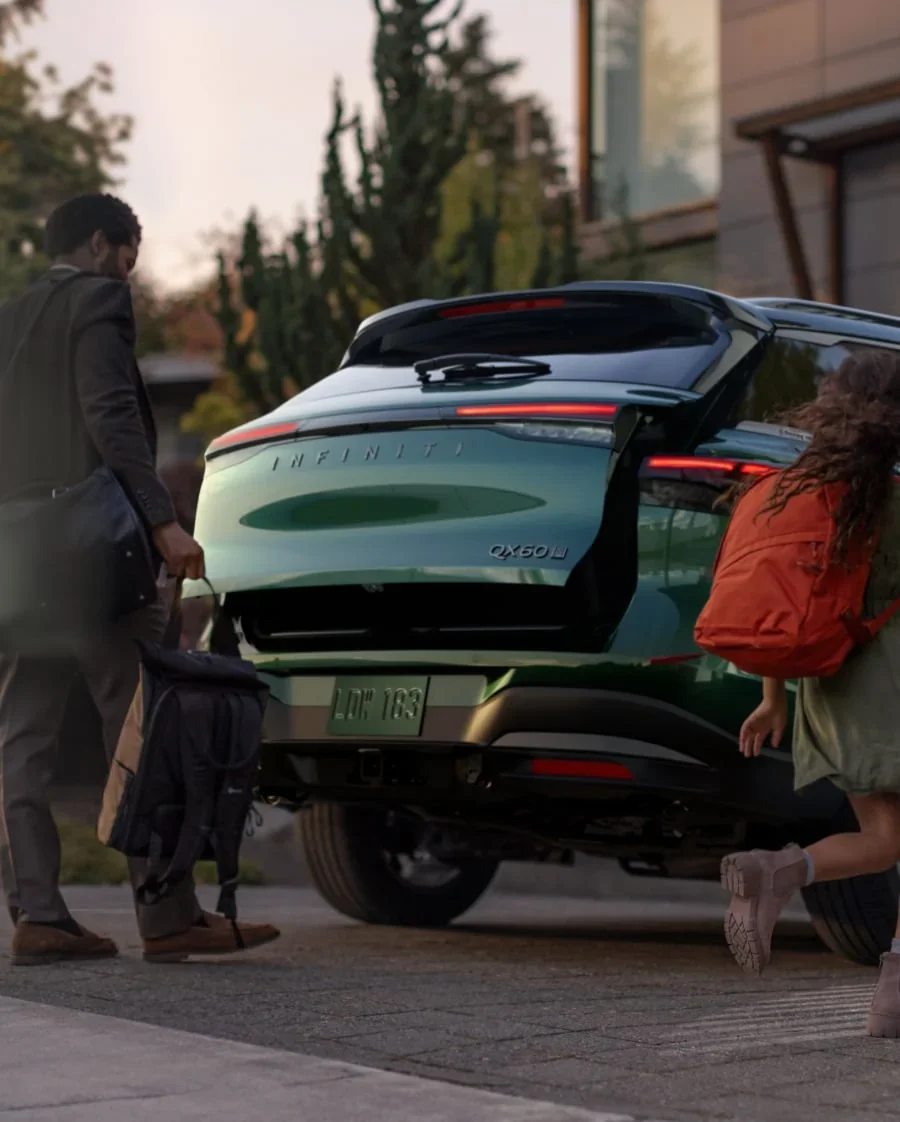 2027 INFINITI QX60 rear liftgate open showing cargo space for beach gear